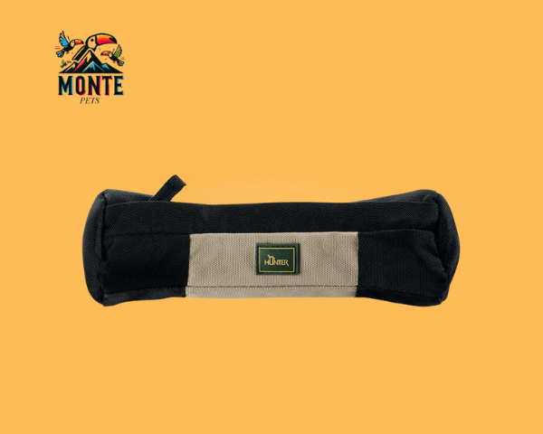 Allzwecktasche Hunter Snacks Beige von MONTE PETS auf orangefarbenem Hintergrund.